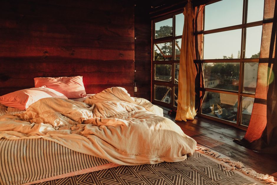 Morning sunlight streaming through a bedroom window